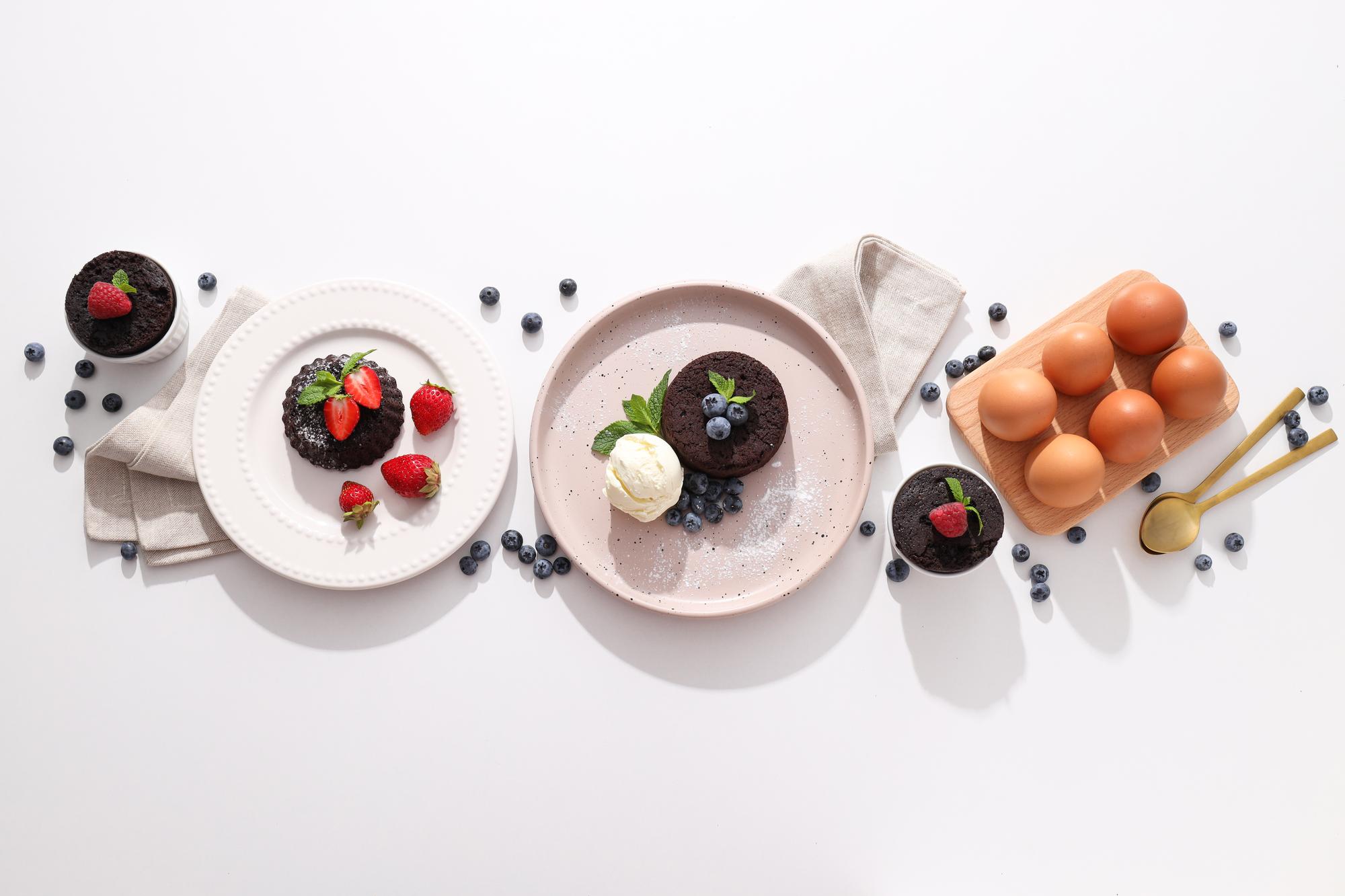 Selection of plated dishes on workshop table